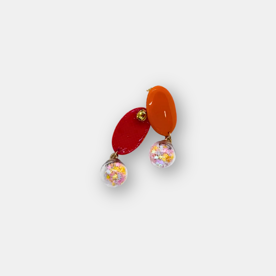 Pendientes naranja con colgante de estrellas