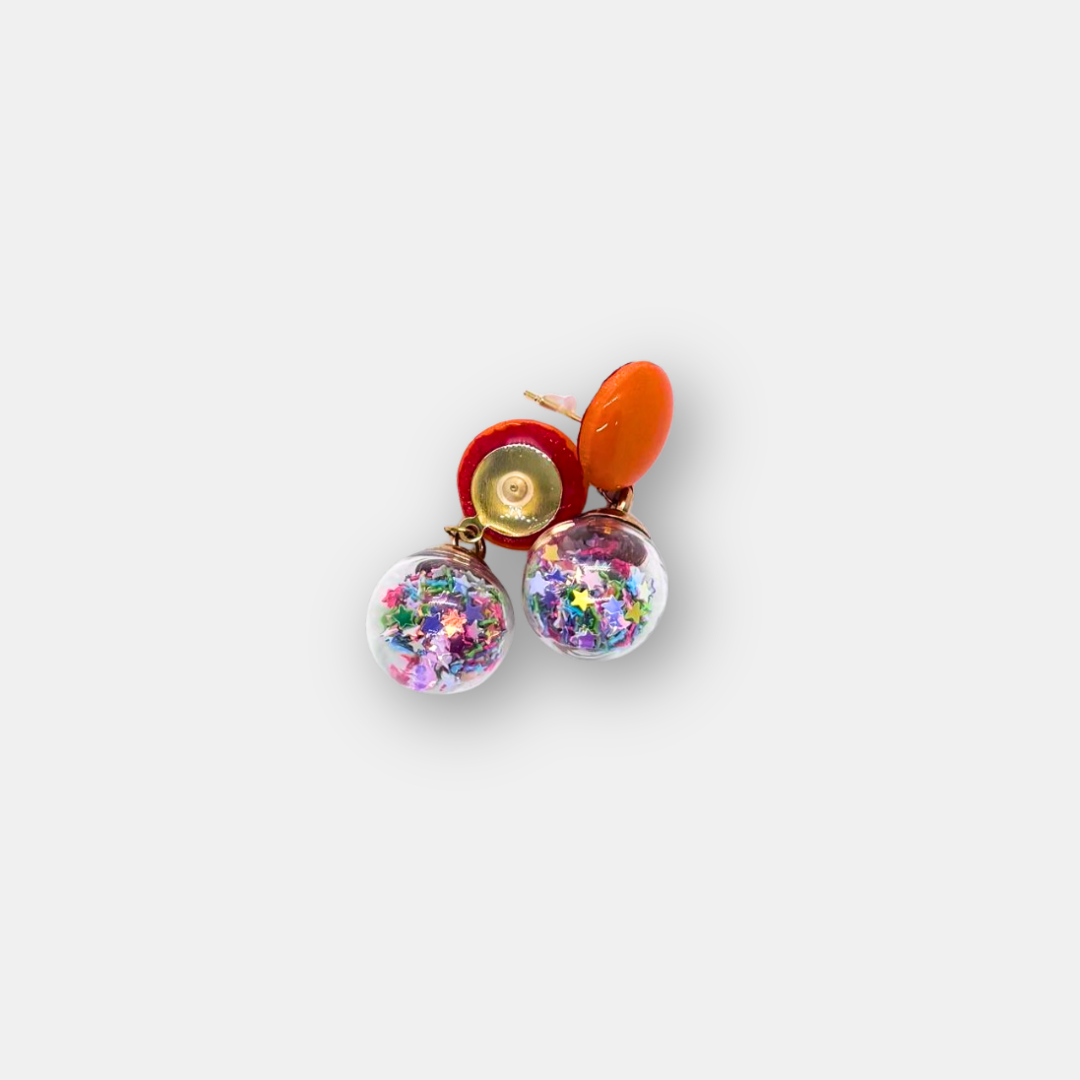 Pendientes circulares naranja con colgante de estrellas